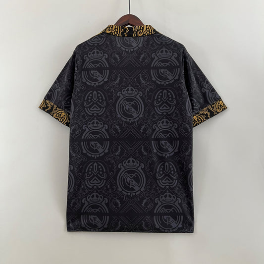 Maillot Real Madrid polo noir et or