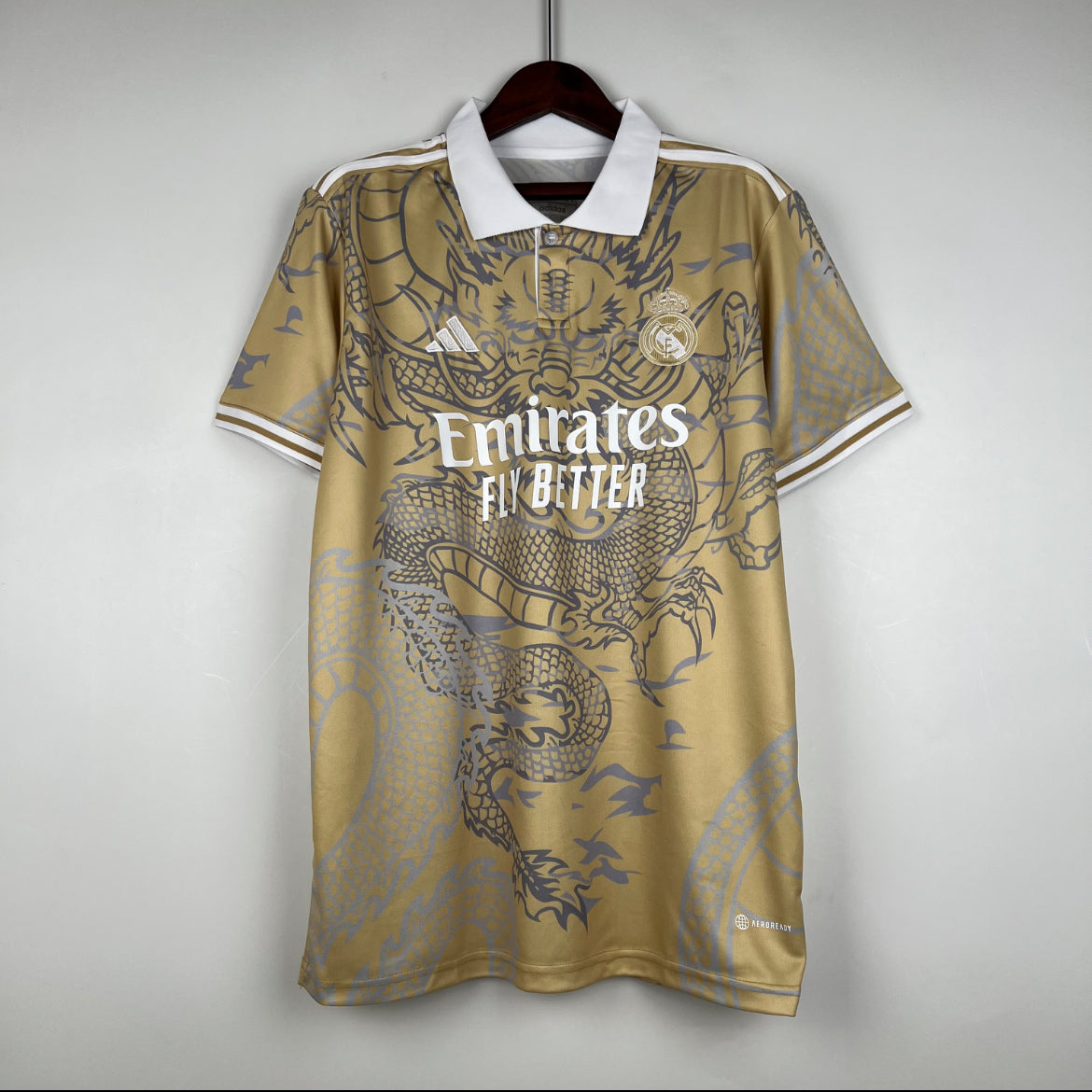 Maillot Real Madrid dragon polo doré